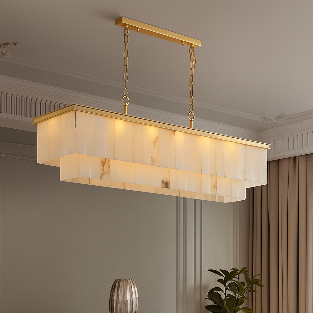 Modern pendant light fixture hanging in a room with neutral decor.