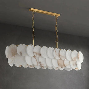 Moonshade Marble Dining Room Chandelier with natural Spanish marble and brass construction emits soft, warm light for elegant ambiance