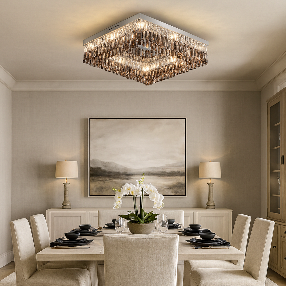 Elegant dining room featuring the Giano Crystal Flush Mount by Morsale.com with smoke grey crystals, beige walls, a landscape painting, table for six with beige chairs, a white orchid centerpiece, and two lamps on a sideboard.