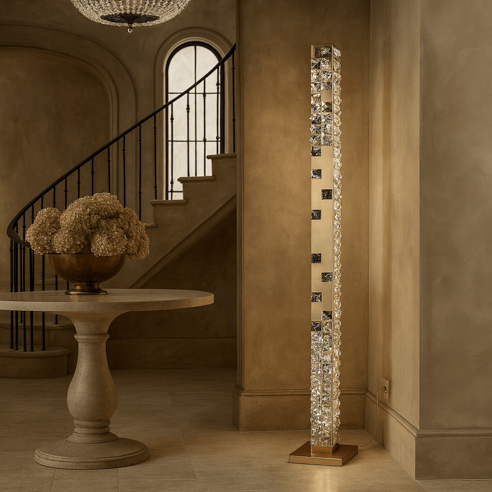 
                  
                    Decorative floor lamp with crystal accents in a room with a staircase and table.
                  
                