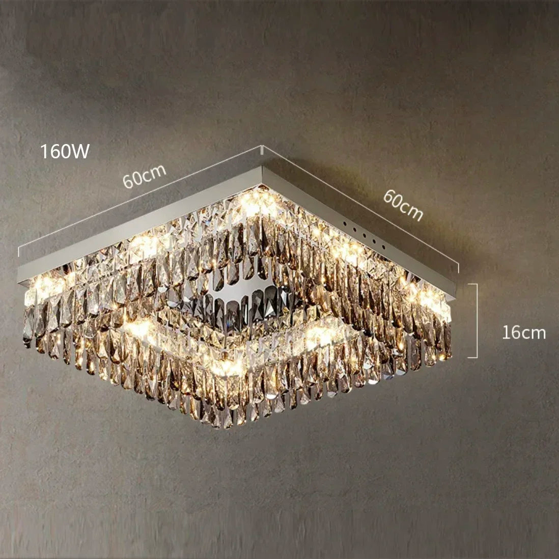 A close-up image of a square Giano Crystal Ceiling Light by Morsale.com, measuring 60 cm by 60 cm in width and 16 cm in height. This luxury chandelier has a contemporary design with multiple crystal strands and 160W power, emitting bright light.