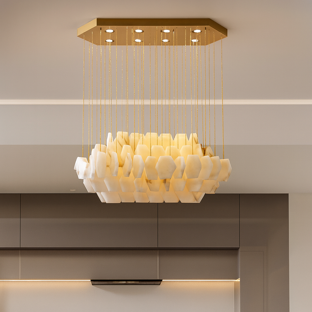 
                  
                    The Arden Marble Chandelier by Shopp578 features a gold rectangular base with suspended gold cables holding geometric, cream-colored elements that resemble clustered crystals, adding an elegant touch to any contemporary interior.
                  
                