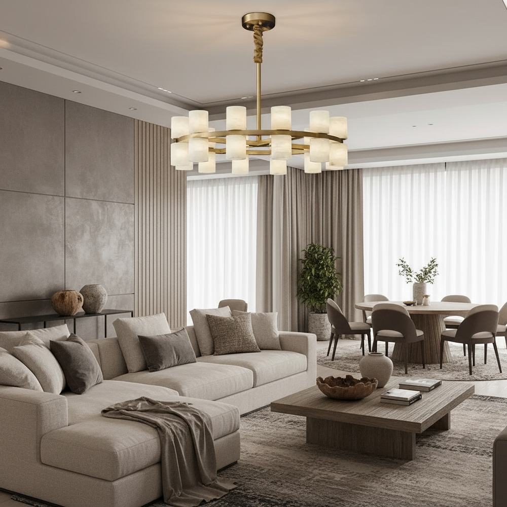 
                  
                    A modern living room featuring a beige sectional sofa, neutral decor, a Morsale Lunara Marble Chandelier, rectangular coffee table, and a dining area with a round table and six chairs by large windows with sheer curtains.
                  
                