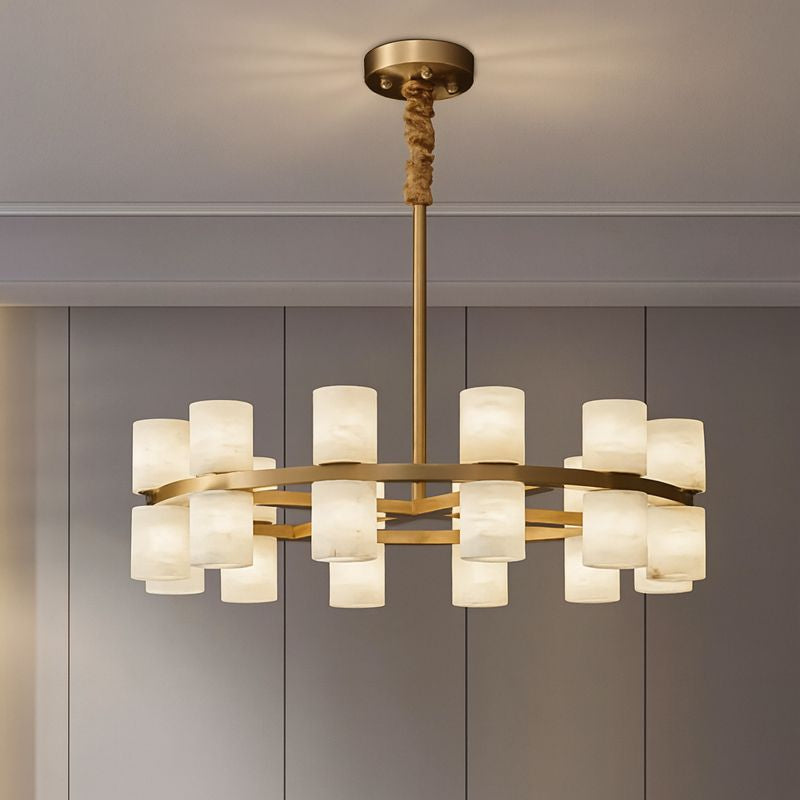 The Lunara Marble Chandelier by Morsale features a gold circular frame and sixteen frosted glass shades, suspended by a rope-wrapped gold rod. This striking fixture offers statement lighting for modern spaces with neutral wall panels.