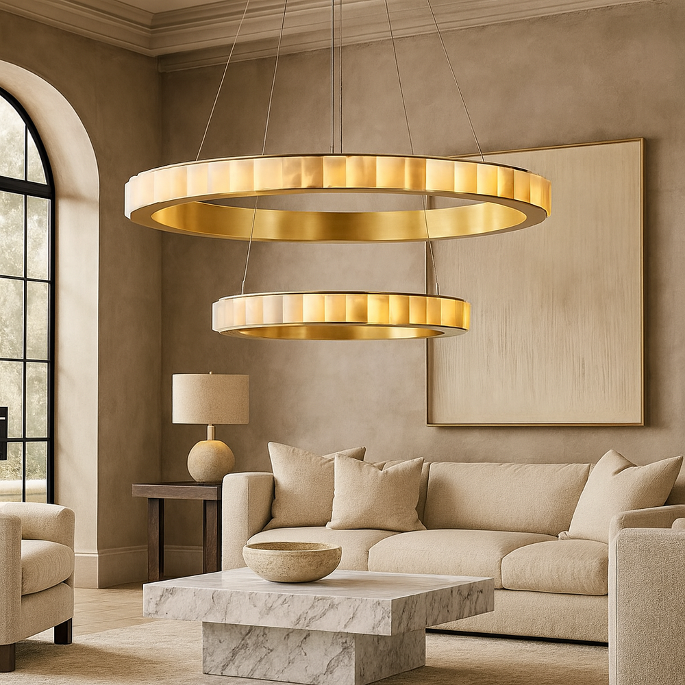 
                  
                    Modern living room with a gold chandelier, beige sofa, and marble coffee table.
                  
                