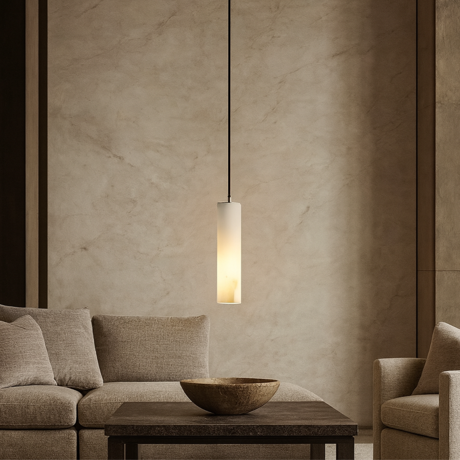 A modern living room with a beige couch, wooden coffee table, and Morsale.com's Linea Natural Marble Pendants illuminating the space against a textured beige wall.
