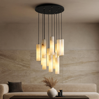 Morris Marble Pendant Chandelier featuring elegant hanging marble lights in a modern living room setting.