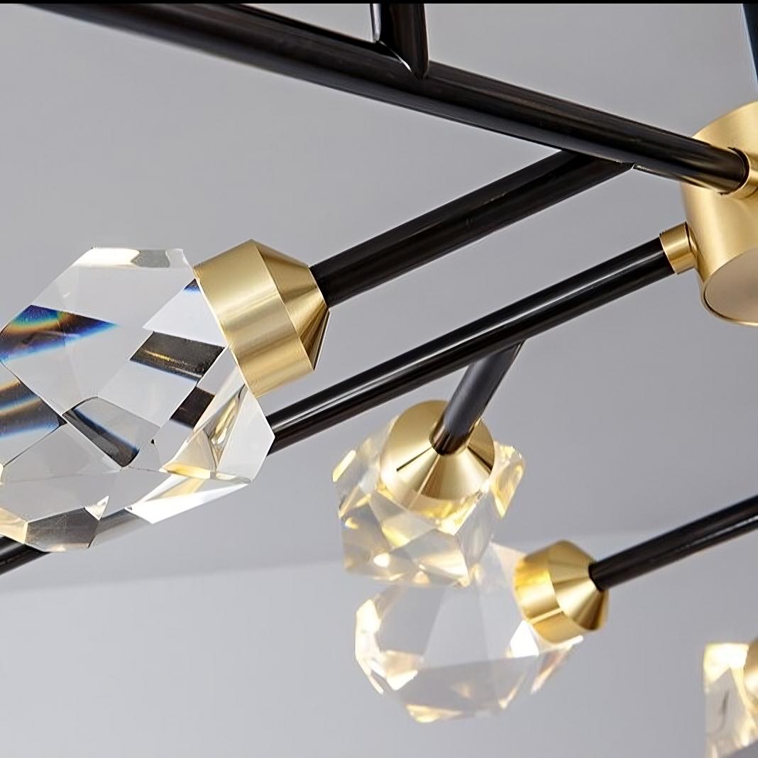 A close-up of a Bari Crystal Branch Chandelier in Black from Morsale.com featuring geometric crystal cubes and sleek black rods with gold accents, reflecting light on a neutral background.