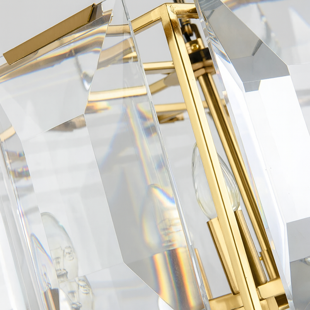 
                  
                    The Brookhill Crystal Dining Chandelier from Morsale.com features a gold metal frame and large clear faceted glass panels that reflect light, creating subtle rainbow effects—an ideal statement piece for your dining room.
                  
                