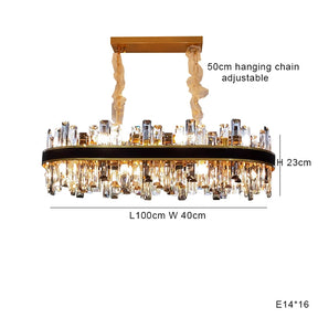 The Calvi Modern Dining Room Chandelier from Morsale.com features a rectangular design with crystal accents and a gold-toned frame, boasting dimensions of 100cm length, 40cm width, and 23cm height. This exquisite piece, crafted from high-quality materials, includes an adjustable 50cm hanging chain and accommodates 16 E14 bulbs.