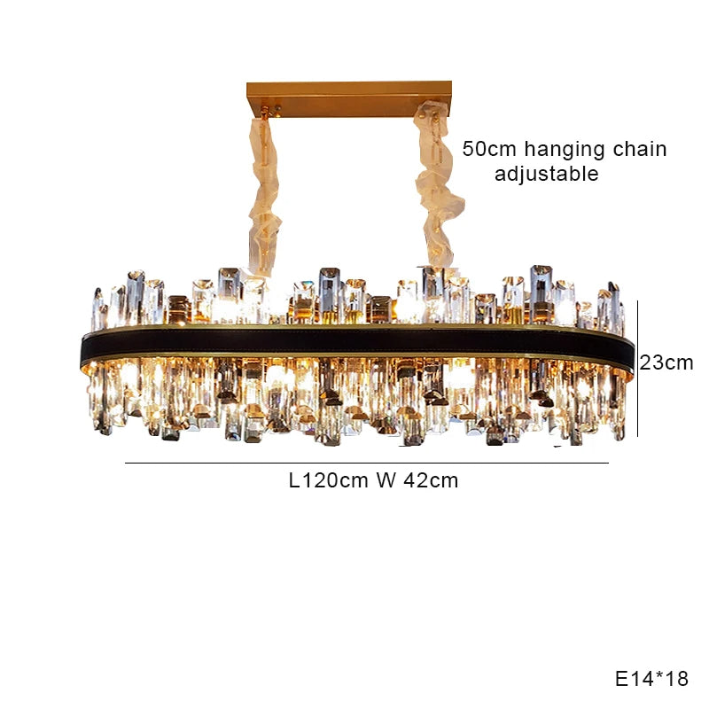 The Calvi Modern Dining Room Chandelier by Morsale.com features a rectangular crystal design with high-quality materials. Measuring 120 cm in length, 42 cm in width, and 23 cm in height, it has an adjustable 50 cm hanging chain and uses 18 E14 bulbs. Multiple hanging crystals adorn the gold-colored base for a stunning modern aesthetic.