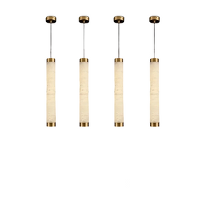 Four 23" Natural Marble Pendant Lights from Morsale.com with beige fabric shades and brass accents are suspended in a straight line. Featuring a unique design, these dimmable LED lights hang from black cords attached to small, round brass ceiling mounts against a white background.