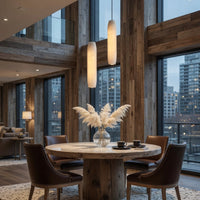 Modern dining room with wooden table and chairs, large windows, and cityscape view.