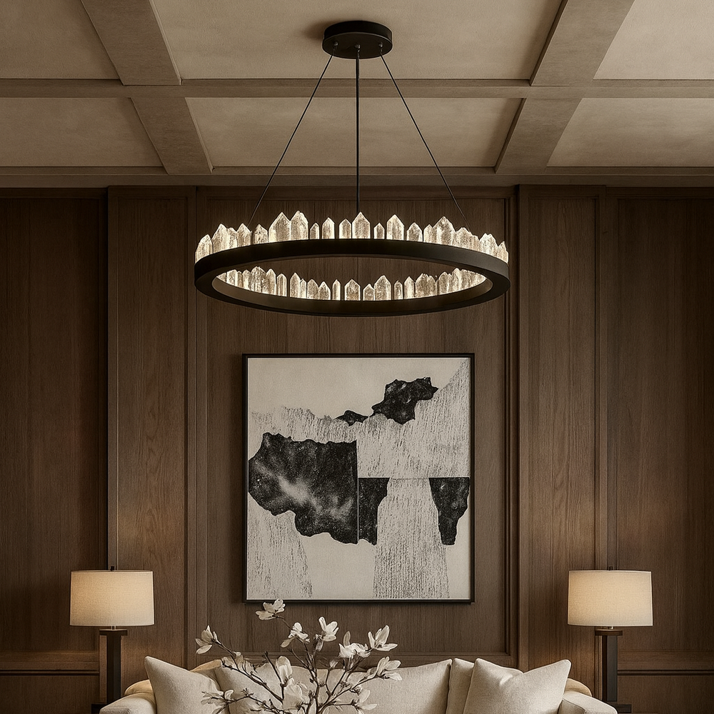 
                  
                    Modern living room with a chandelier, sofa, coffee table, and wall art.
                  
                