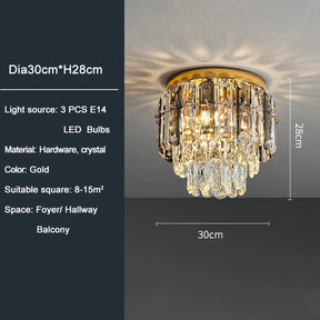 The Morsale.com Giano Ceiling Light Fixture features a gold ceiling chandelier with handmade crystal accents. It uses three E14 LED bulbs and measures 30cm in diameter and 28cm in height. Suitable for spaces of 8-15m², this flush mount light is perfect for foyers, hallways, or balconies.