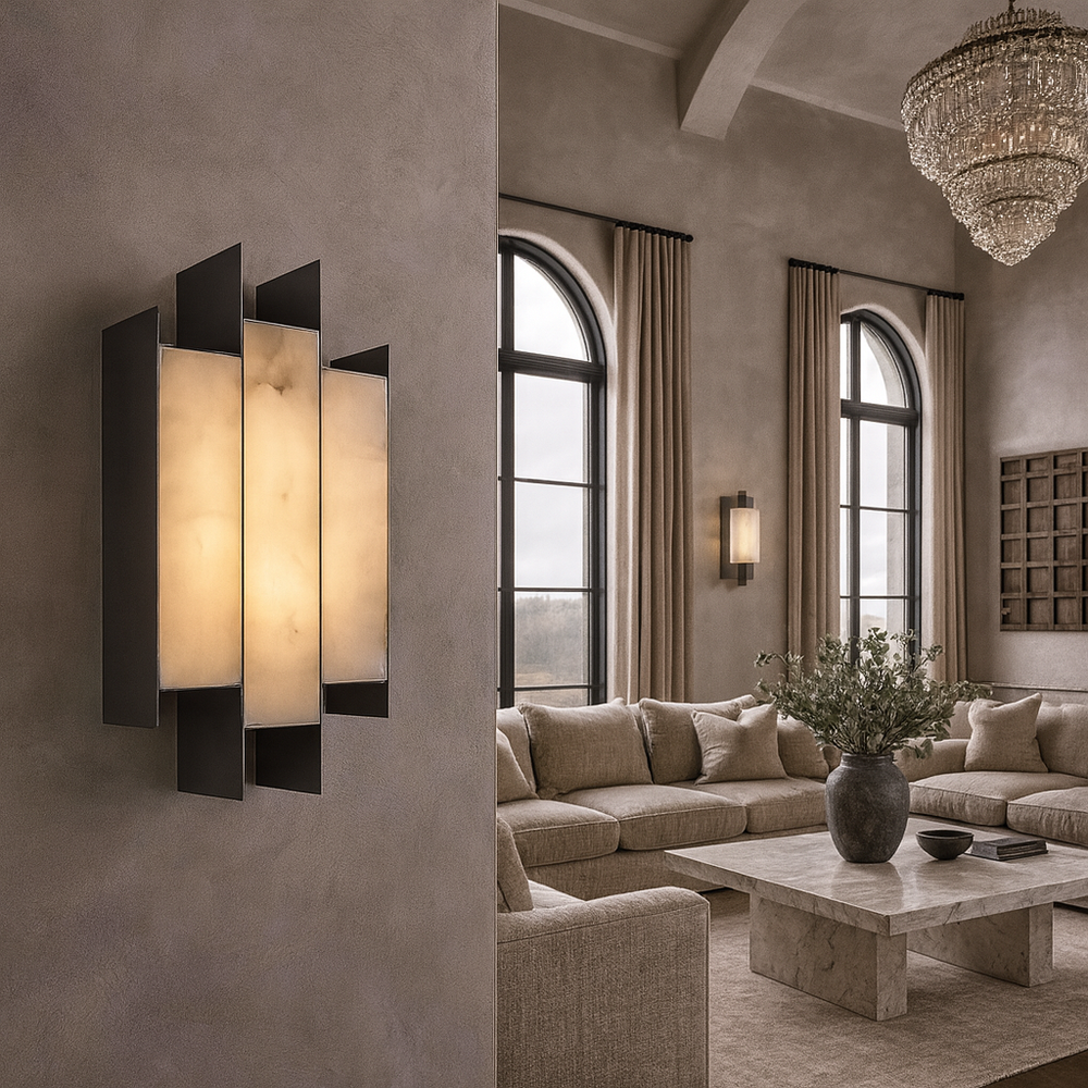 
                  
                    Elegant living room with high ceilings, arched windows, beige sofas, a marble coffee table, and a large plant. The Morsale Arden Marble Sconce adds warm lighting alongside a chandelier, creating a cozy, sophisticated atmosphere.
                  
                