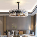 Napoli crystal modern chandelier by Morsale.com, a sculptural round fixture of genuine K9 crystal on sweeping stainless steel arms.