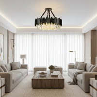 Modern living room with two beige sofas, a wooden coffee table, and floor lamps. The Gio Crystal Chandelier from Morsale.com adds elegance. Large windows with sheer white curtains fill the neutral-toned space with natural light for a cozy feel.