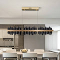 Rivaro Modern Linear Chandelier illuminating a contemporary kitchen with a sleek design and elegant silhouette.
